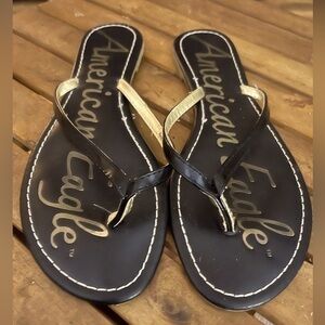 American Eagle Flip Flops in GUC. Size 10 - soles look good.